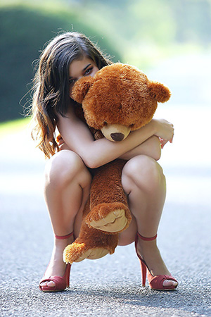 Cute Nika Loves Her Teddy Bear